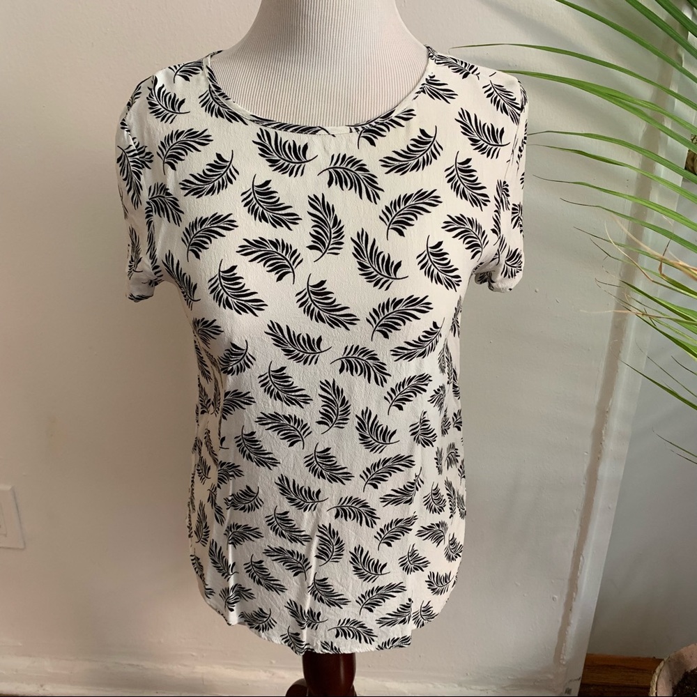 H&M White blouse with all over feather design